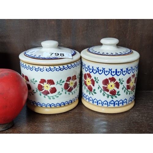 798 - Two charming Nicholas Mosse Pottery spongeware jars with lids. Featuring the iconic Old Rose pattern... 