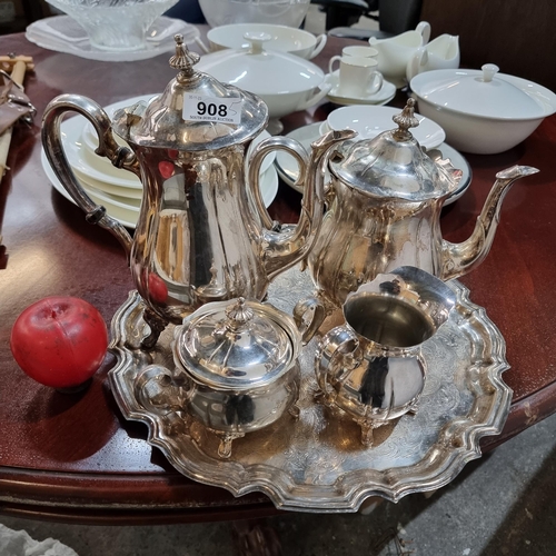 908 - A lovely vintage English silver plated service set comprising of a coffee pot, teapot, creamer and s... 