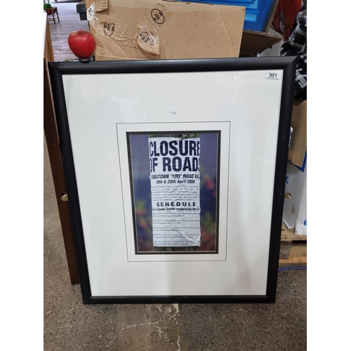 951 - A large photograph of a poster announcing the closure of roads for the Cookstown 100 Road Race which... 