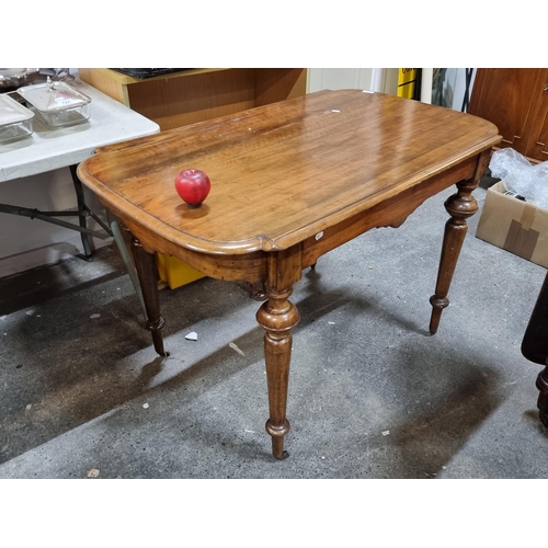 955 - Star lot : A very handsome Victorian breakfast table boasting carved edge, turned legs and original ... 