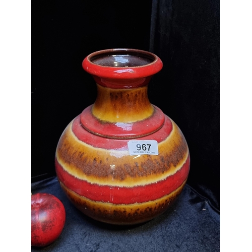 967 - A wonderful vintage West German ceramic vase with an orange and red Flambe glaze. In very good condi... 