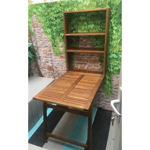 939 - A large wooden display shelving unit with two shelves. Comes with  detachable foldable support. Indo... 