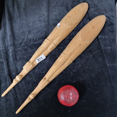 871 - Two large long hand carved wooden African tribal masks. Look to have good age.