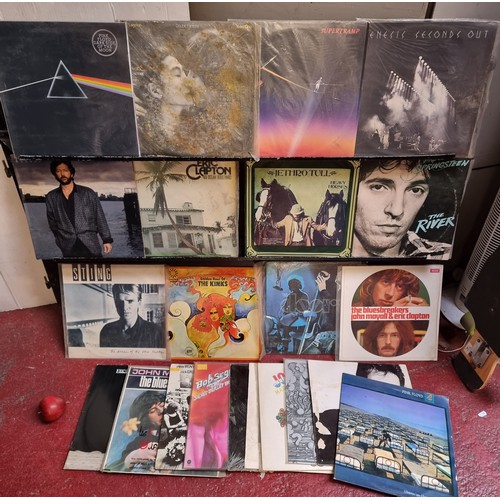 248 - A brilliant collection of vintage vinyl records including artists such as Pink Floyd, Eric Clapton a... 