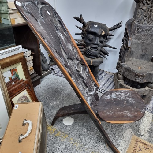 809 - Star Lot : A wonderful and very heavy African carved wooden birthing chair with beautiful bird and f... 