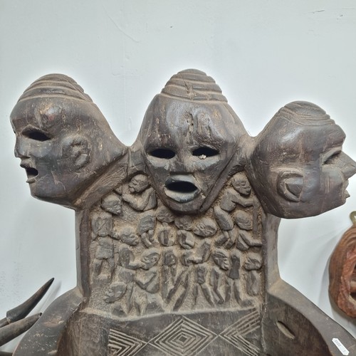 810 - Star Lot : A marvelous and very heavy African carved wooden Bamileke tribal chiefs armchair featurin... 