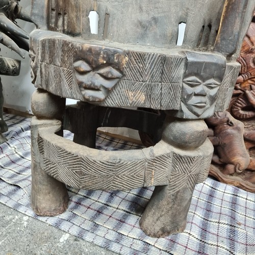 810 - Star Lot : A marvelous and very heavy African carved wooden Bamileke tribal chiefs armchair featurin... 