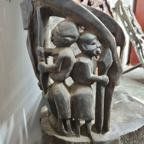 810 - Star Lot : A marvelous and very heavy African carved wooden Bamileke tribal chiefs armchair featurin... 