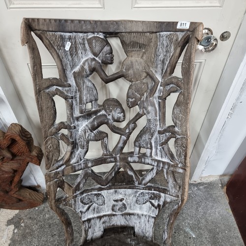 811 - Star Lot : A wonderful and very heavy African carved wooden birthing chair with figurative motifs to... 