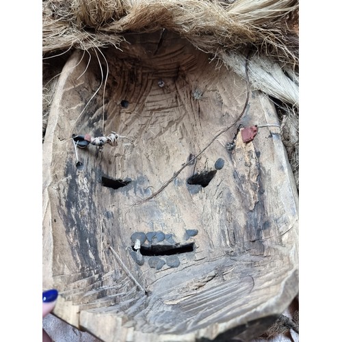 883 - Star lot : An African antique tribal Dan mask featuring rope weaving and dreadlock hair. The Dan Peo... 