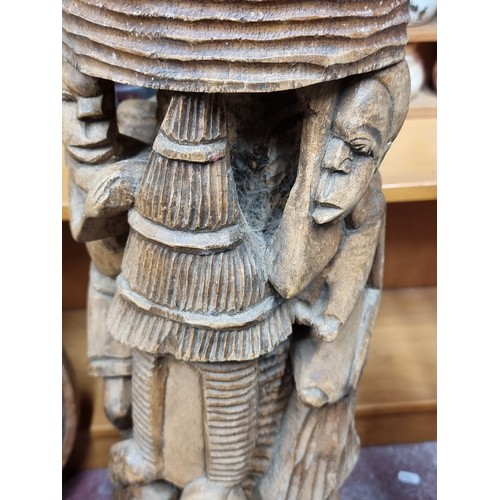 892 - A wonderful large hand carved African statue with beautiful highly accurate intricately carved detai... 