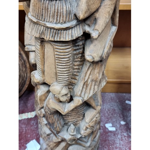 892 - A wonderful large hand carved African statue with beautiful highly accurate intricately carved detai... 