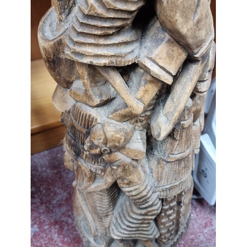 892 - A wonderful large hand carved African statue with beautiful highly accurate intricately carved detai... 