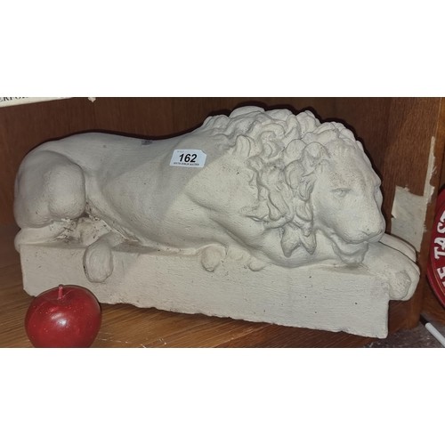 408 - A very heavy good size stone garden figure of a lion held a platform. Previously was in auction 22/1... 