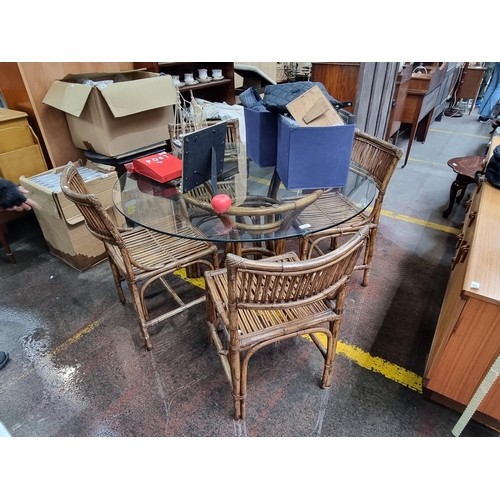 985 - Three pieces of matching Bamboo furniture including a Lovely glass table with 4 chairs, a matching b... 