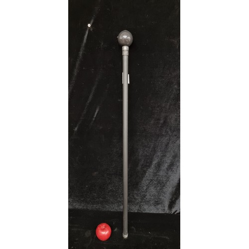 130 - A very good walking sword/stick with heavy pool ball for a pommel and blade inside to fight off the ... 