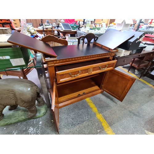 431 - Star Lot : A solid well made home bar with large pull out top, two drawer and two additional cupboar... 