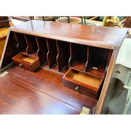 901 - A nice clean example of a vintage writing bureau, Always like these the top folds down to use as a d... 