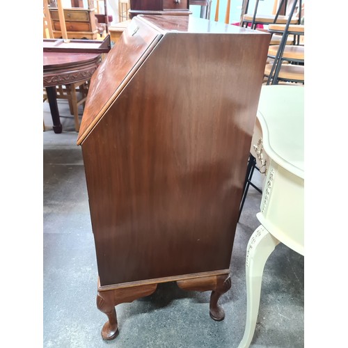 901 - A nice clean example of a vintage writing bureau, Always like these the top folds down to use as a d... 