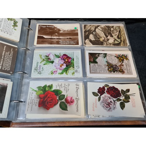 961 - Star Lot: A postcard album containing a massive collection of approx 420 birthday greetings cards fr... 