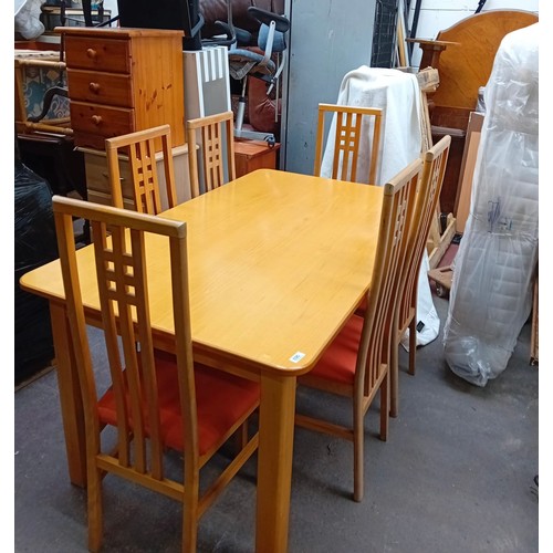 994 - A nice clean maple dining chairs with 6 Rennie Mcintosh style chairs with burnt orange fab.