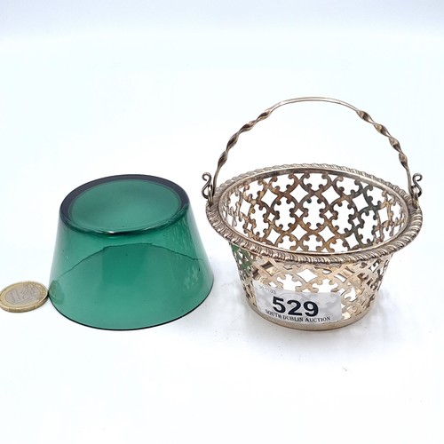 529 - A very attractive sterling silver basket with pie crossed rim with lattice cut body together with or... 