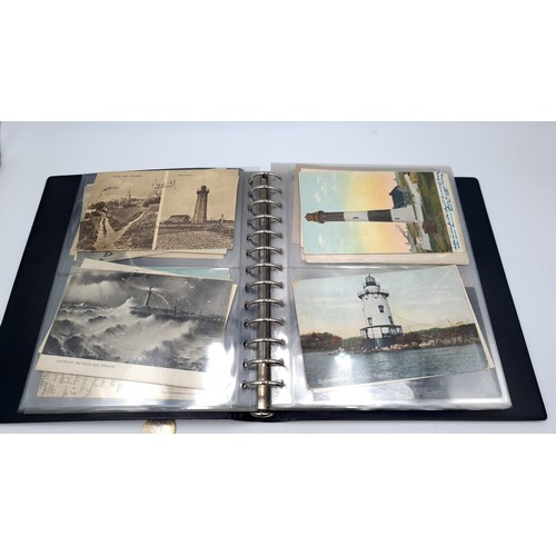 568 - An album containing photographs of Irish lighthouses together with some scenes of west Cork also an ... 