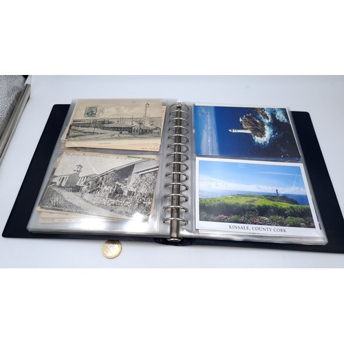 568 - An album containing photographs of Irish lighthouses together with some scenes of west Cork also an ... 