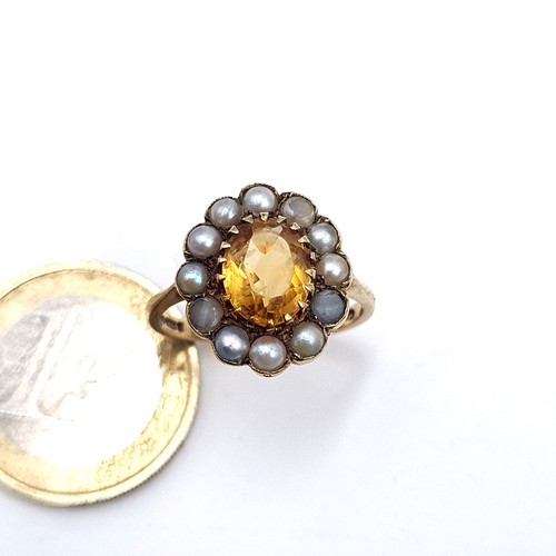 601 - A fine quality 9K gold citrine stone ring with a cultured pearl surround, hallmarks for London, size... 