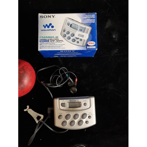 275 - A vintage Sony Walkman SRF-M37L, with original packaging, epitomizing classic portable audio technol... 