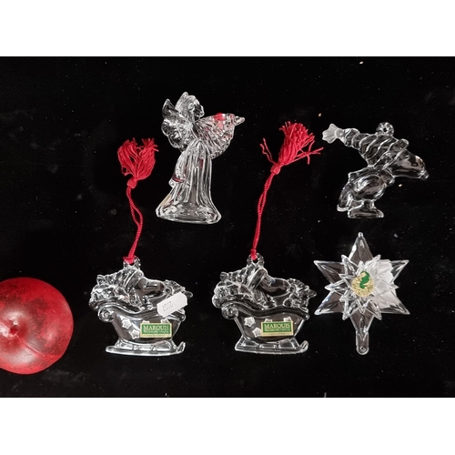 292 - A vibrant collection of five Waterford crystal Christmas ornaments, perfect for adding a touch of sp... 