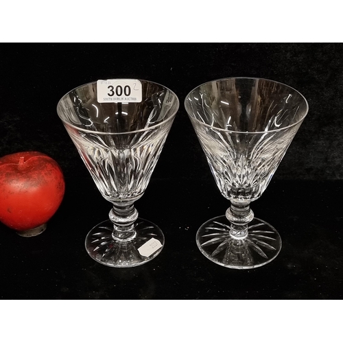 300 - A pair of huge  Waterford Crystal stemmed glasses in the Eileen pattern, featuring detailed cut patt... 