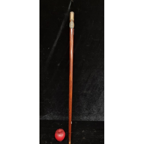 333 - A superb example of a Wold war solid mahogany military swagger stick With A George Regina crest.