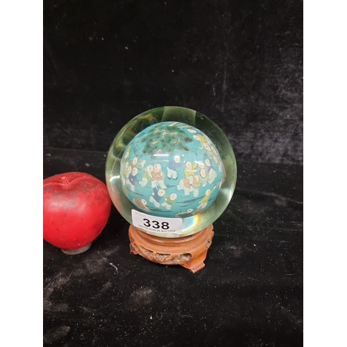 338 - An intricate vintage Chinese hand blown heavy glass globe featuring a reverse hand painted scene dep... 