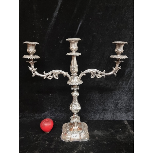 341 - A very heavy and large vintage silver plated candelabra with three branches showcasing exquisite cra... 