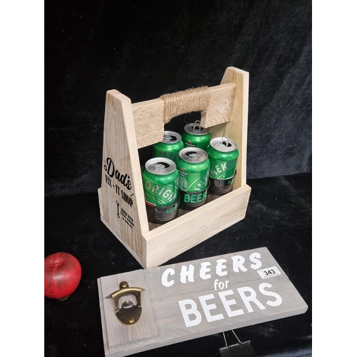 343 - Two items including a wooden beer caddy with space for six cans and a sweet slogan to side. Along wi... 