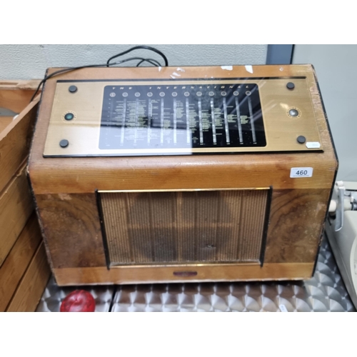 460 - A good vintage radio made in Dundrum, Dublin, robust oak exterior with intricate fabric grille, evok... 