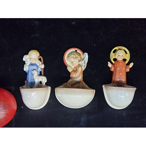 164 - Three vintage West German Hummel holy water fonts with angle finials. In very good condition.