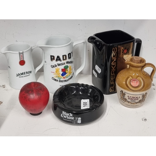 168 - Five ceramic pub items including whiskey jugs with one from Wade PDM John Player Superkings, a Paddy... 