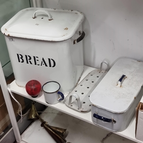 172 - Three vintage enamel kitchen items including a bread bin with lid, fish poacher with removable tiers... 