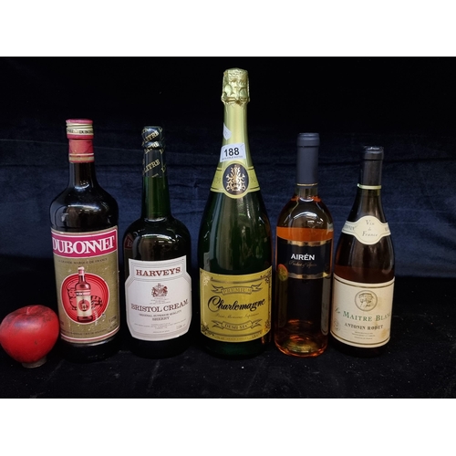 188 - Five sealed bottles including a 1.5L Premium Charlemagne Demi Sec, a 1L Harveys Bristol Cream Sherry... 