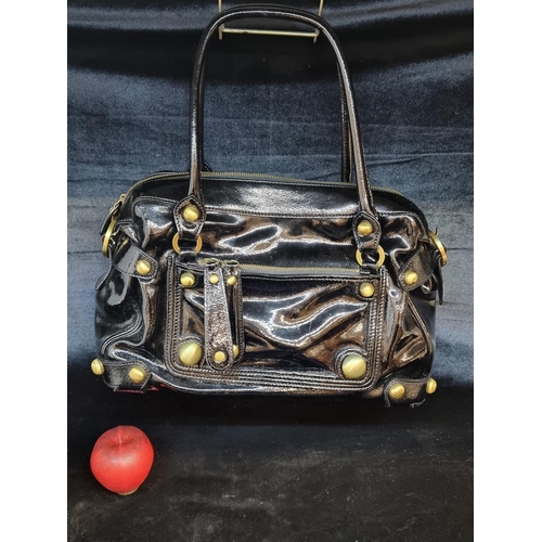 204 - A gorgeous Karen Miller ladies patent leather handbag, in very good condition.