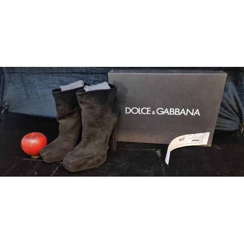 216 - Star Lot - A brand new pair of ladies Dolce & Gabbana black suede boots with long high heel and fitt... 