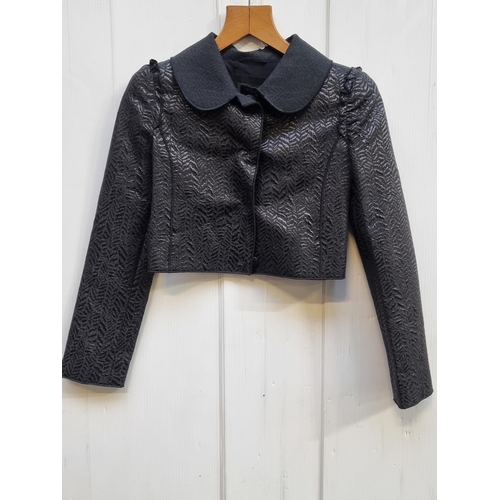 233 - Star Lot - A brand new with tag ladies Dolce & Gabbana short jacket, boasting black wool blend broca... 