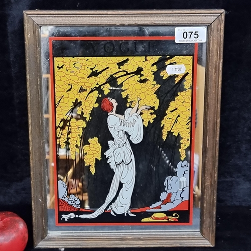 75 - A vintage mirror printed with an art deco image from Vogue magazine. Housed in a wooden frame.