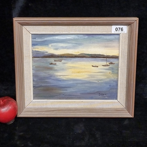 76 - A sunset oil on canvas coastal landscape painting. Signed E. Cleary bottom right and housed in a woo... 