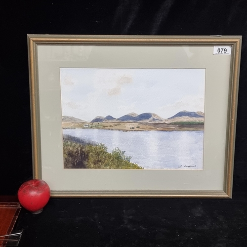 79 - An original watercolour on paper painting featuring a landscape scene with shadowy blue hills flanki... 