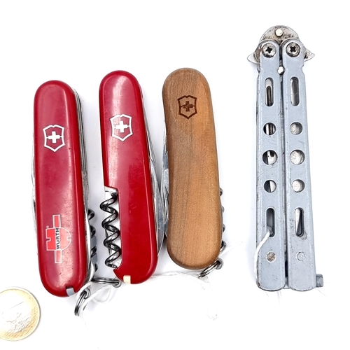 505 - A collection of 4 knives consisting of  three genuine Swiss army knives including of one specially m... 