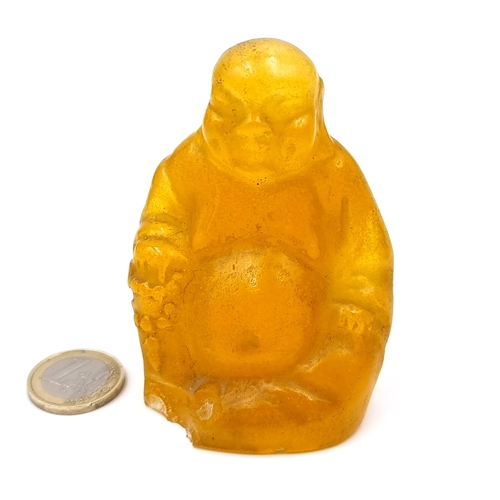 536 - A vintage carved soapstone happy Buddha figure. Dimensions - 9cm x 6cm. Weight 337grams.