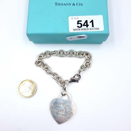 541 - An original Tiffany sterling silver heart shaped charm bracelet marked Tiffany & Co, weight 43.16 gr... 